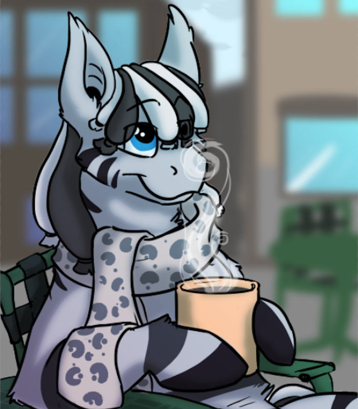 Ruzeth wrapped in a scarf with a coffee.